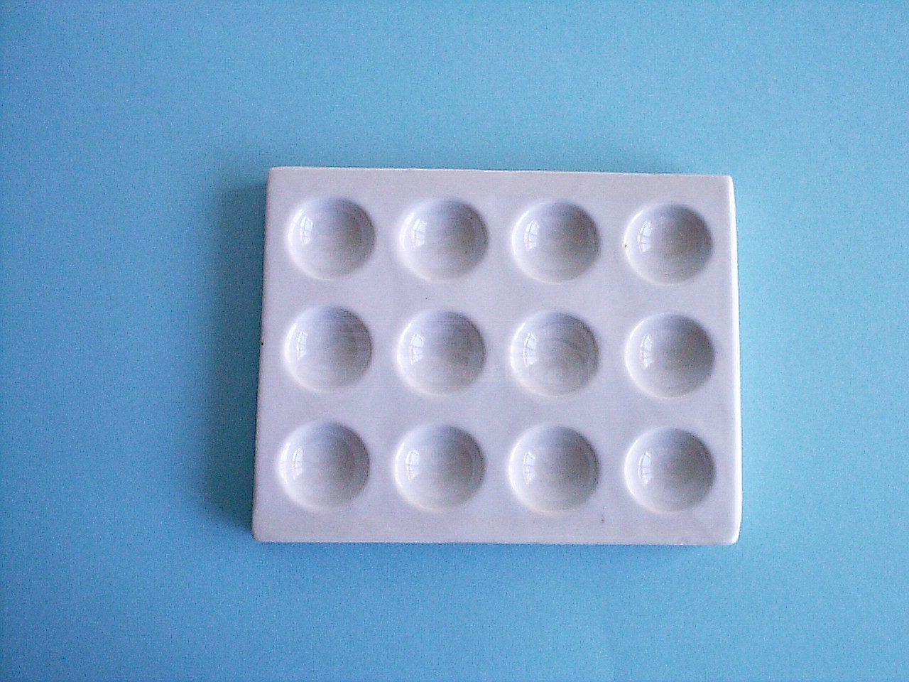 Placa porcelana para tinción